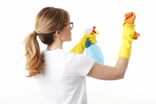 Local W10 cleaning team working around renovation dust in a commercial space
